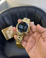 Watch Generation 15 - Smart Watch with Analog and Digital Display, Gold-Toned Bracelet, Touchscreen Interface, and Wireless Charging. 