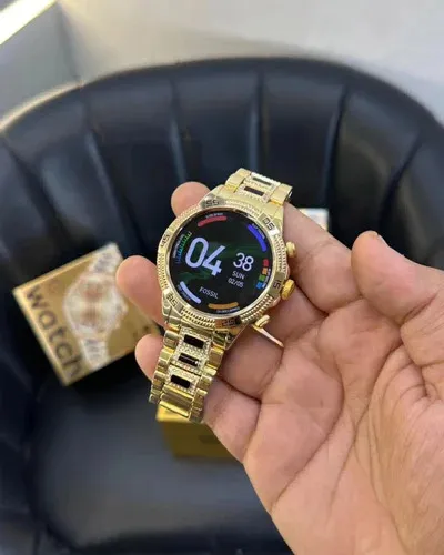 Watch%20Generation%2015%20-%20Smart%20Watch%20with%20Analog%20and%20Digital%20Display,%20Gold-Toned%20Bracelet,%20Touchscreen%20Interface,%20and%20Wireless%20Charging%20-%20Image%204