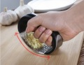 Stainless Steel Garlic Press Rocker - Premium Garlic Mincer With Silicone Peeler & Scraper - Arc Shape Design Garlic Crusher With Comfortable Grip Used For Peeling Garlic Ginger Lemmon And More. 