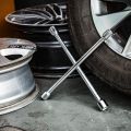 "Heavy-Duty Cross Wheel Spanner - Durable 4-Way Lug Wrench for Easy Tire Change". 