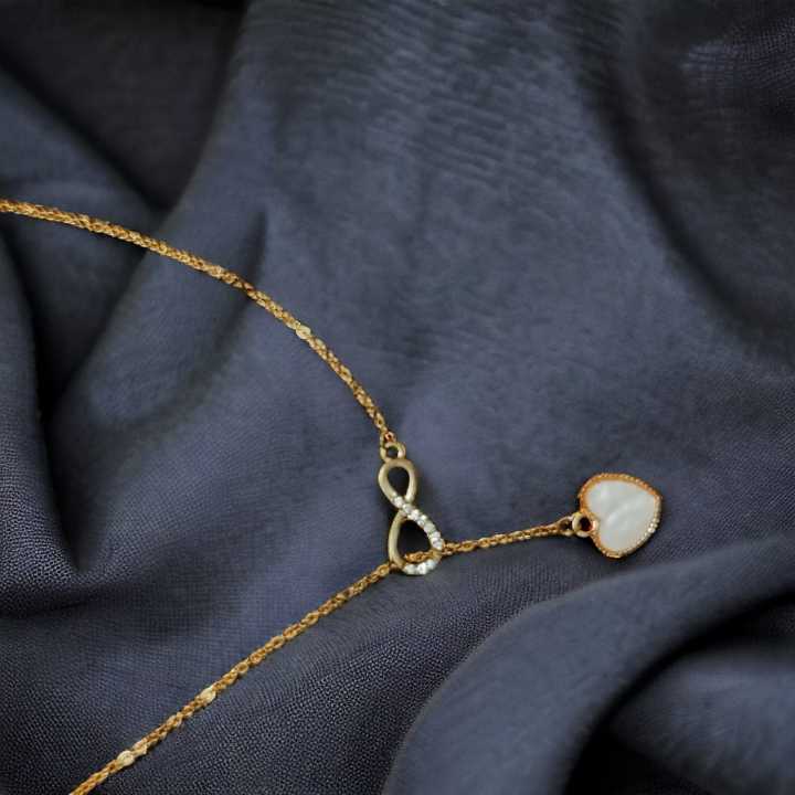 Golden Pendant with White Heart and Infinity Symbol - Elegant Women's Jewelry