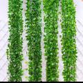 Pack of 1 artificial garland green leaf bail 6.9 ft natural look for decoration artificial flowers. 
