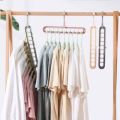 Magic Hanger - 9 hole closet organizer - space saving magic plastic hangers - organizer 9 hole hangers for clothes paints trousers shirt hanger 9 in 1 hangers - Multi Purpose Hanger - Clothes Plastic Hanger - High Quality Hanger. 