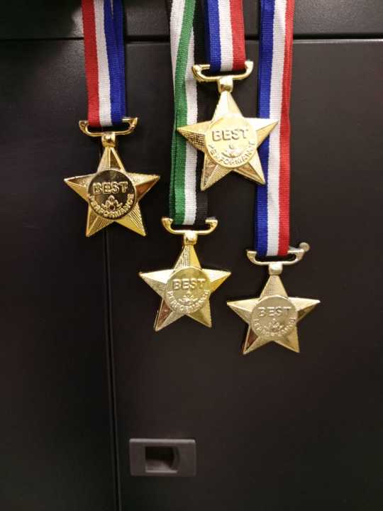 Pack%20of%204%20Medal%20-%20Sports%20Reward%20-Plastic%20Medal%20with%202%20Color%20Strip%20-%20Emboded%20medal%20-%20Star%20Shaped%20model%20-%20Sport%20medal%20-%20Image%205