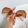 Sandmdm 2024 Luxury Round Gradient Sunglasses Women Metal Curved Temples Eyewear Ocean Rimless Fashion Sun Glasses Ladies UV400. 