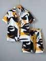 "Men's Stylish Two-Piece Short Sleeve Shirt and Shorts Set - Abstract Print in Black, White, and Yellow". 