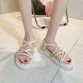 Thick women 2023 new fashion round toe flat sponge cake thick soled beach shoes Roman sandals for women. 
