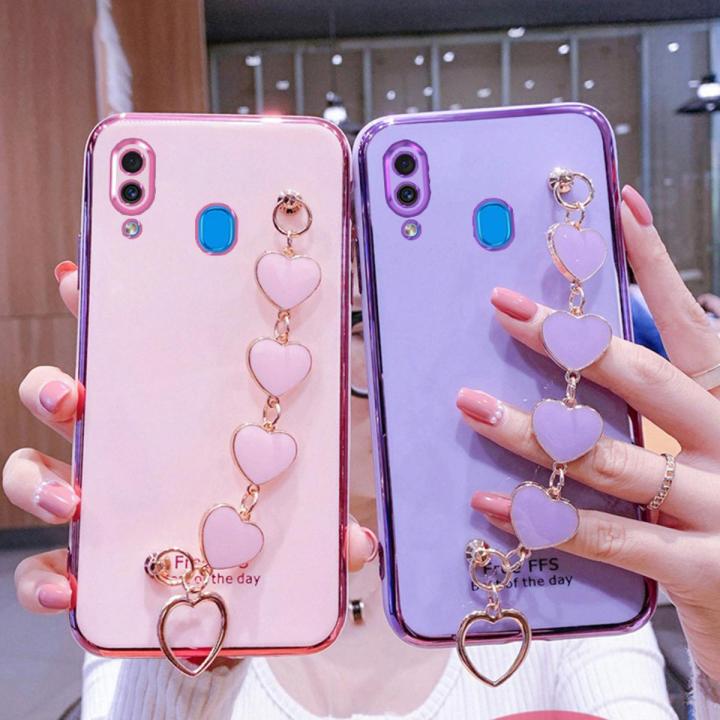 For Samsung Galaxy A20 Back Cover with Love Heart Chain Wrist Strap Fashion Bracelet Shiny Plating Bumper Protective Case Silicone Shockproof Mobile Phone Cases