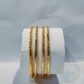 4-Piece Gold Kara Set-Top Picks in Gold-Plated Karas and Bangles for Women and Girls-Gold Karas for Women: Classic and Contemporary Designs-Discover the Beauty of Gold-Plated Kara Sets for Women and Girls-China Gold-Plated Bangles and Karas. 