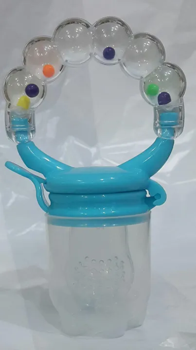 BABY%20FRUIT%20AND%20VEGETABLE%20FEEDING%20PACIFIER%20WITH%20RATTLE%20-%20FRUIT%20FEEDER%20-%20FRUIT%20SOOTHER%20-%20Image%207
