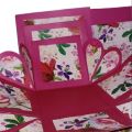 surprise 3 layers magenta explosson box with chocolates. 
