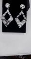 New Stylish Design Fashion Jewellery Earrings for Girls ,white earings , black earings for girls, snake texcture earings for girls. 