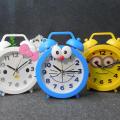 Creative cute cartoon alarm clock children students get up clock small clock desk clock KT desktop pendulum clock simple small alarm clock. 