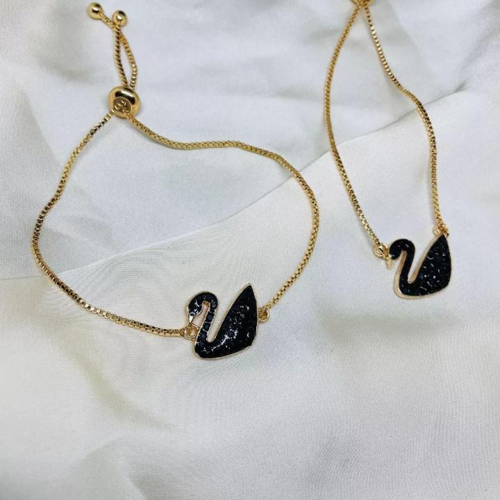 Order Studio Presenting Black Swarovski Swan Necklace for Girls