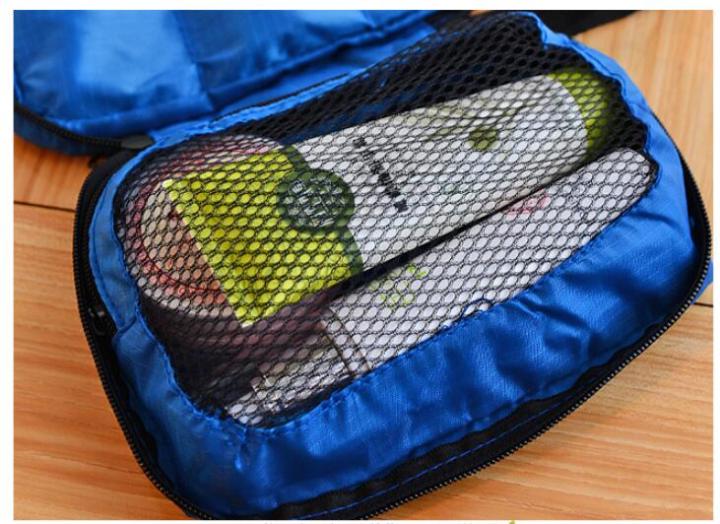 Travel%20Storage%20Bag%20with%20Hanging%20Hook%20%7C%20Multi-Pocket%20Toiletry%20Organizer%20%7C%20Space-Saver%20for%20Cosmetics,%20Perfume%20&%20Accessories%20%7C%20Portable%20Handle%20Design%20%7C%20Toiletries%20&%20Cosmetics%20Travel%20Bag%20-%20Image%204
