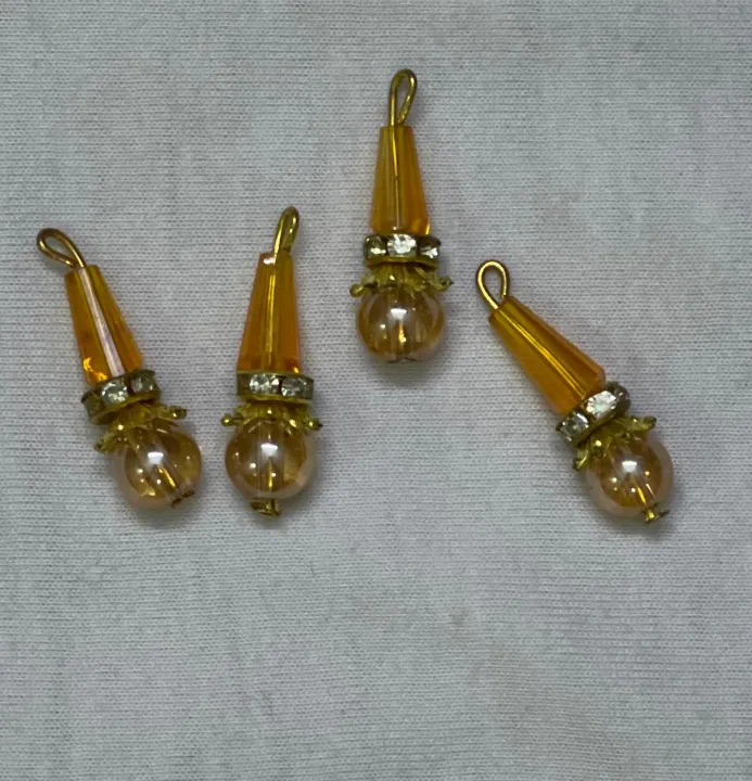 Beautiful%20Hanging%20Beads%20for%20Necklines%20%E2%80%93%204%20Pcs%20Pack,%20Premium%20Decorative%20Tassels%20for%20Kameez,%20Trouser%20&%20Dupatta,%20Export%20Quality%20Limited%20Edition%20Embellishment%20Accessories,%20Vibrant%20Stylish%20Add-Ons%20at%20Just%20Rs.%20149%20-%20Image%203