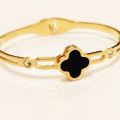 Elegant Gold-Plated Four-Leaf Clover Bangle with Black Enamel and Crystal Accents |stainless steel bracelet -Luxury Jewelry for Women |Best Gift for Girls. 