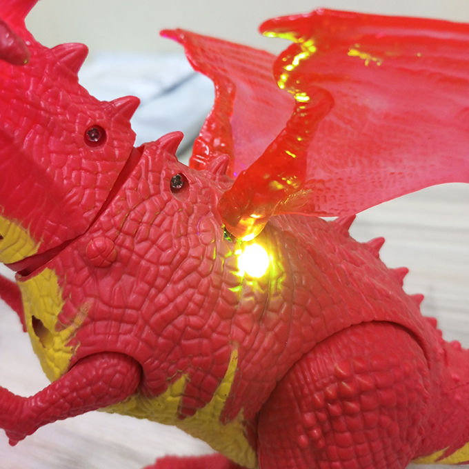 Smoke%20Dragon%20Toy%20With%20Lights%20&%20Sound%20-%20Movable%20Neck%20and%20Tyre%20-%20Operated%20Battery%20-%20Red%20-%20Image%207