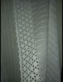 White dupatta with jhali border. 