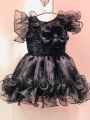 baby black fancy flayer frock for girls. 