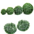 "Vibrant Plastic Artificial Grass Ball: Perfect for Indoor & Outdoor Decor". 