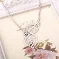 Creative Simple Double Gold Leaf Pendant Necklace Women's Trend Punk Tassel Chain Pendant Fashion Ladies Party Jewelry Gifts. 
