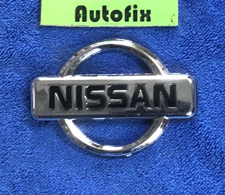 Nissan Plastic Stylish Logo Silver 03 Inches 01 Piece