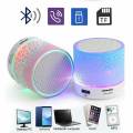 Mini Bluetooth Wireless Portable Speaker with LED Dancing Light & High Bass Sound For All Mobile With FM Multicolours. 