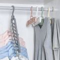 Multiple Clothes Hanger Space Saving Wardrobe Organizer with 9 Holes for Shirts and Pants. 
