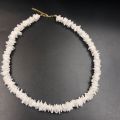 Puka Shell Necklace for Women Boho Tropical Hawaiian Beach Puka Shell Surfer Choker Necklace Jewelry Mens Womens. 