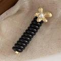 Simple Yet Stylish Rubber Band For Women's Hair Unique Headwear For Bubble Braid Hairstyles Statement-making Hair Accessory With Embedded Gems Elegant Ponytail Phone Line Headwear Luxurious Headband With Intricate Jewelry Details. 