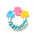 Rattle Shape Silicone Baby Teether - Safe, Non-Toxic, BPA-Free, Soft and Durable Teething Toy for Infants – Perfect for Soothing Sore Gums and Promoting Oral Health. 