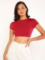 SOLID MOCK NECK CROP TOP Discover the Allure of Solid Mock Neck Crop Tops". 