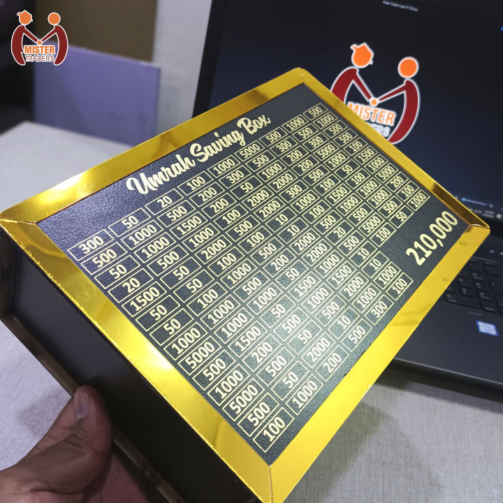 Umrah%20Saving%20Box%20-%20Premium%20Acrylic%20Money%20Collection%20Box%20for%20Hajj%20&%20Umrah%20-%20210,000%20Target%20Goal%20-%20Islamic%20Gift%20Idea%20-%20Black%20and%20Gold%20Design%20-%20Umrah%20Box%20-%20Image%204
