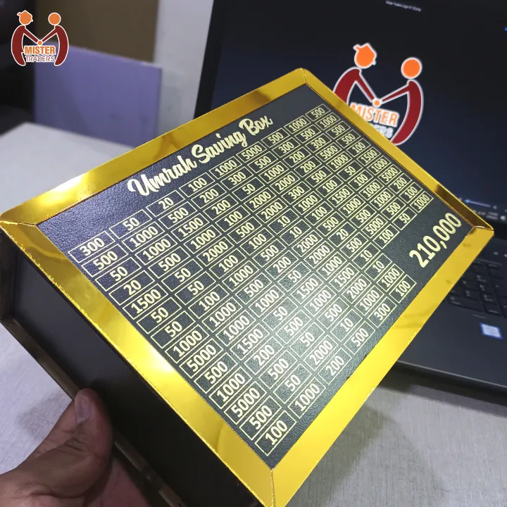 Umrah%20Saving%20Box%20-%20Premium%20Acrylic%20Money%20Collection%20Box%20for%20Hajj%20&%20Umrah%20-%20210,000%20Target%20Goal%20-%20Islamic%20Gift%20Idea%20-%20Black%20and%20Gold%20Design%20-%20Umrah%20Box%20-%20Image%204