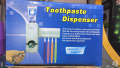 Smart Toothpaste Dispenser with Built-In Toothbrush Holder - Touchless, Convenient, and Durable. 