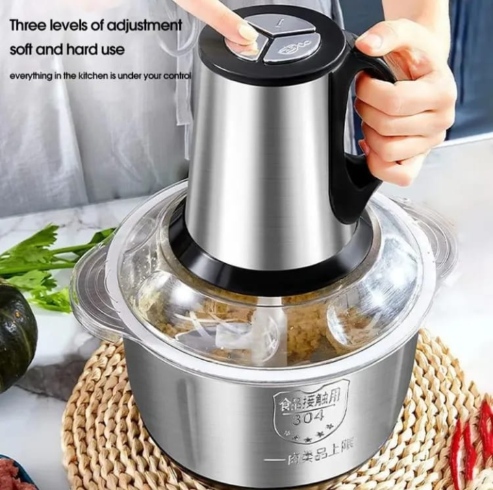 Stainless%20Steel%20Electric%20Meat%20Grinder%20Chopper%20with%20Sharp%20Blades%20-%201000%20Watts%20Motor,%20Multifunctional%20Food%20Processor%20for%20Meat,%20Vegetables,%20Herbs,%20and%20Spices%20-%20Silver,%203L%20Capacity%20-%20Image%204