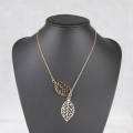 Creative Simple Double Gold Leaf Pendant Necklace Women's Trend Punk Tassel Chain Pendant Fashion Ladies Party Jewelry Gifts. 