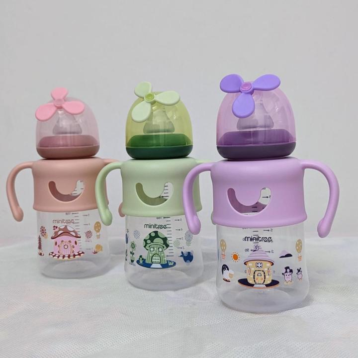 Baby Feeder Of Minitree Brand With Rattles In Red Color