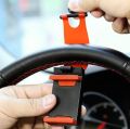 UNIVERSAL CAR STEERING WHEEL MOBILE HOLDER GPS Clip Mount Stand Holder Bracket Car Mobile Holder for Steering Phone Holder Mobile Holder Car Cell Mobile Phone Holder Stand NOTE random color will be delivered. 