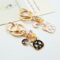 【HOT】 Cute Cat Sweet Key Chain Marinero Small Moon Kitten Anime Keychain Metal Pendant Girls Personality Bag Charm Jewelry Key Ring. 