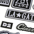 Computer embroidery superscript letters in black and white patches affixed to clothing accessories luggage accessories Aberdeen chapter embroidery fabric sticker badge. 