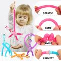 Telescopic Giraffe Suction Cup Toy, (1PC Random Colors) Cute Giraffe Stretch Tube Stress Relief Sensory Toy in Four Different Colors Suction Cup Giraffe Pop Tube Sensor Fidget Toy For Kids, Deformable Sensory Suction Cup Plastic Toy, Suction Robot Toy. 