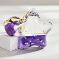 Internet celebrity dithering sound blind TV key chain bag pendant creative floating Kuromi Acrylic oil flowing sand bottle. 