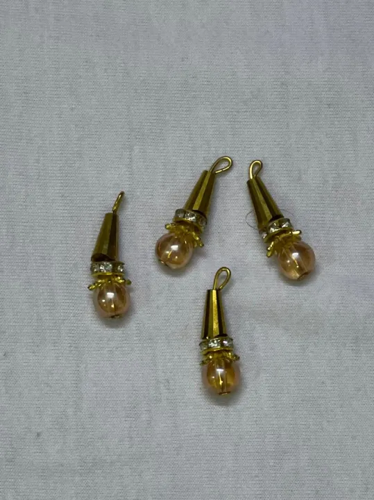 Beautiful%20Hanging%20Beads%20for%20Necklines%20%E2%80%93%204%20Pcs%20Pack,%20Premium%20Decorative%20Tassels%20for%20Kameez,%20Trouser%20&%20Dupatta,%20Export%20Quality%20Limited%20Edition%20Embellishment%20Accessories,%20Vibrant%20Stylish%20Add-Ons%20at%20Just%20Rs.%20149%20-%20Image%202