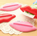 1pc Lovely Lip shape Toothpaste Dispenser tooth accessories teeth Tube Rolling Squeezer Easy use tools. 