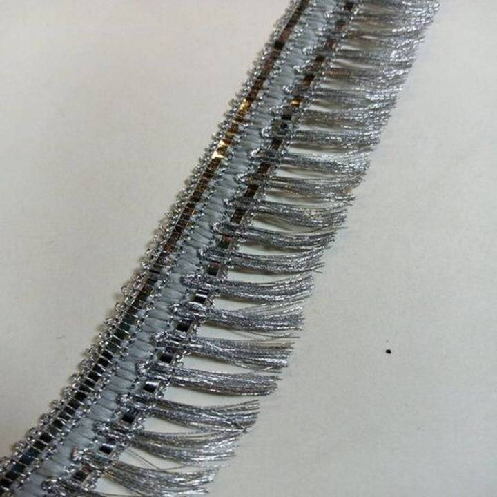 Silver colour kiran lace size is 1 inch for sale in very reasonable price.