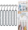 Mishbeeka 4-Pack - Super Magic Changeable Clothes Pluto Plastic Hanger Space Saving Saver Wonder Closet Organizer 9 Holes Holder Cloths and Pants Hanger. 