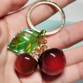 Vibrant Fruit Charms Keychain Colorful Red Fruit Key Chain Metal Resin Cherry Keychain for Purse Backpack. 