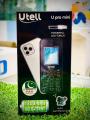 UTell UPro Mini - Stylish Camera - Dual Sim - PTA Approved - 1.8 Inch Display - 1200mAH Battery - Auto call recording - Wireless FM radio - Memory card Supported - 1 Year brand warranty. 